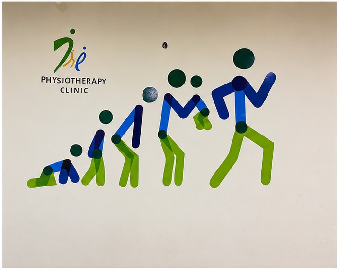 The Physiotherapy Clinic rehabilitation artwork and logo wall